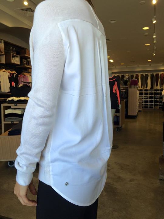 Lululemon white cardi in the front