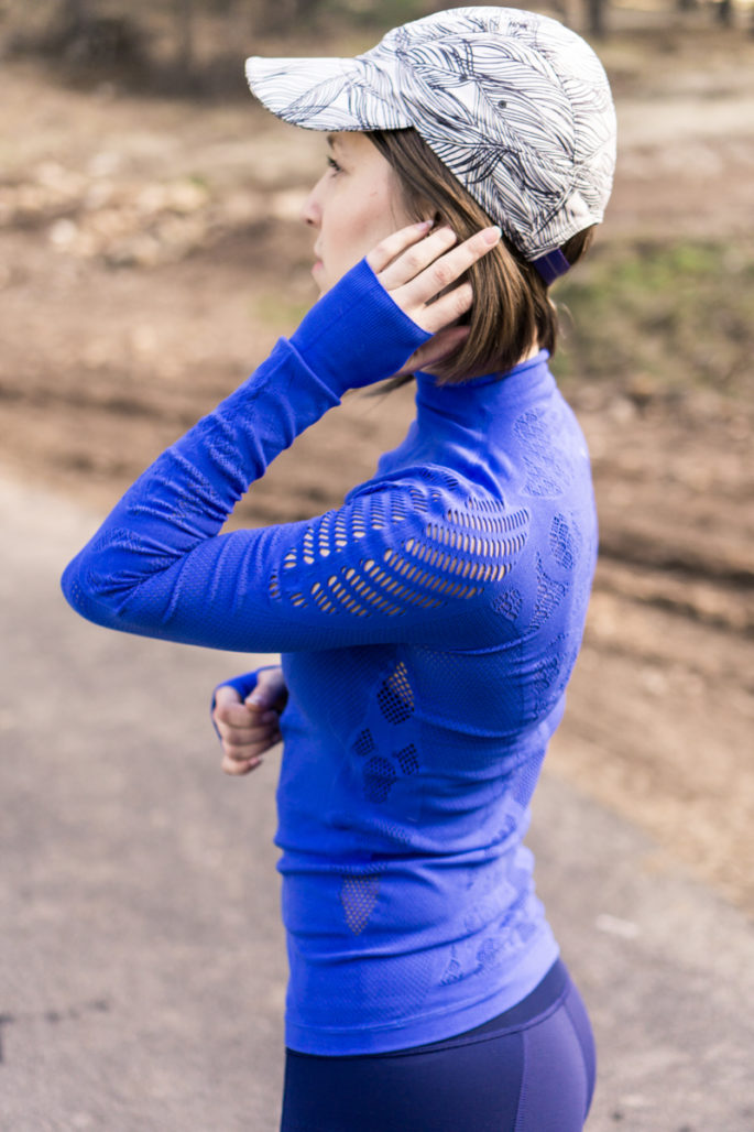 Blue run top with laser cut details