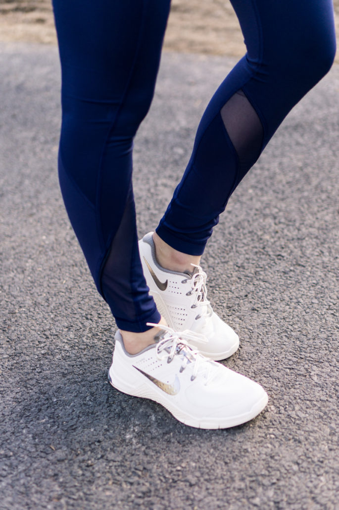 Nike metcons in summit white with navy lululemon tights