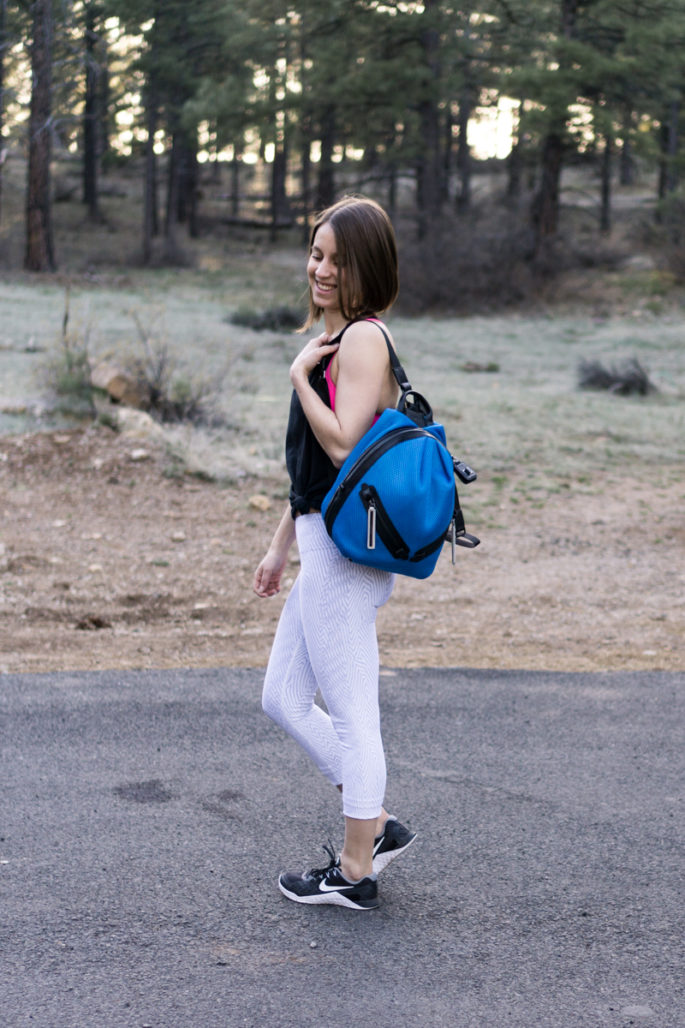 White workout crops + bright blue backpack