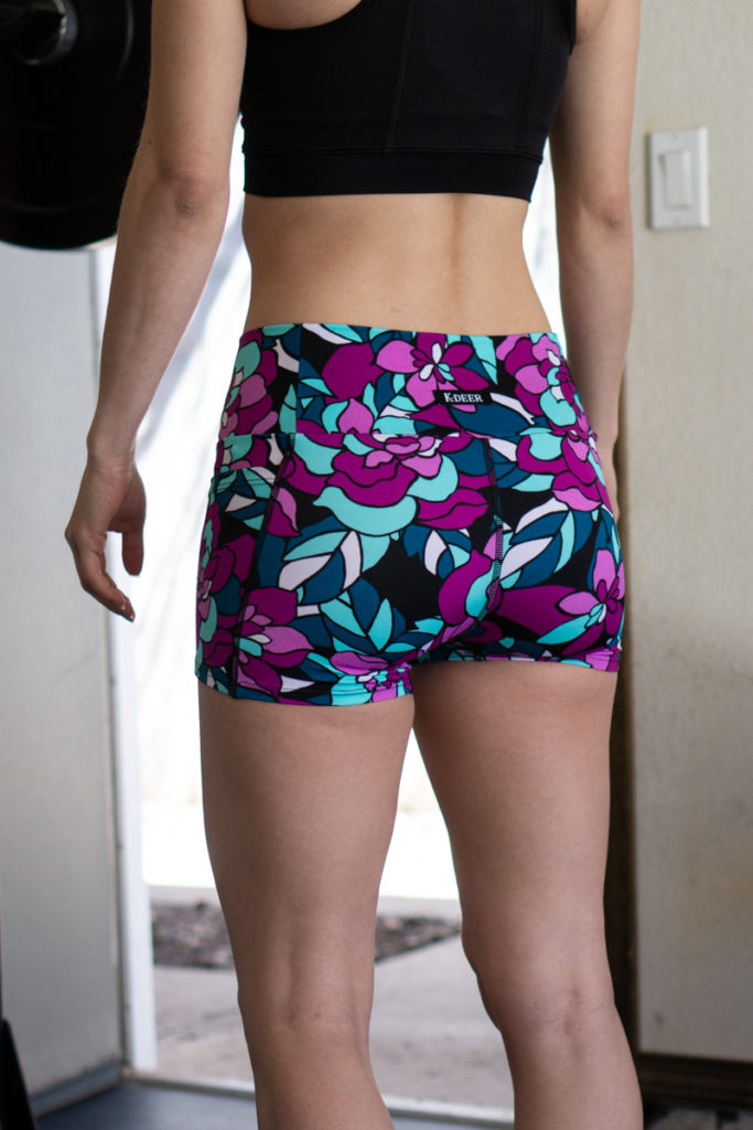 Bright floral workout shorts + crop top outfit